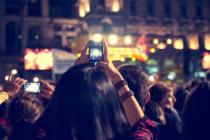 Supporters,Recording,At,Concert,-,Candid,Image,Of,Crowd,At