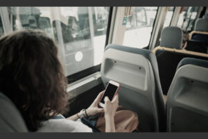 Young,Hipster,Woman,Girl,Sitting,In,Public,Transport,Bus,With