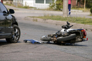 Crash,Moto,Bike,And,Car,On,Road